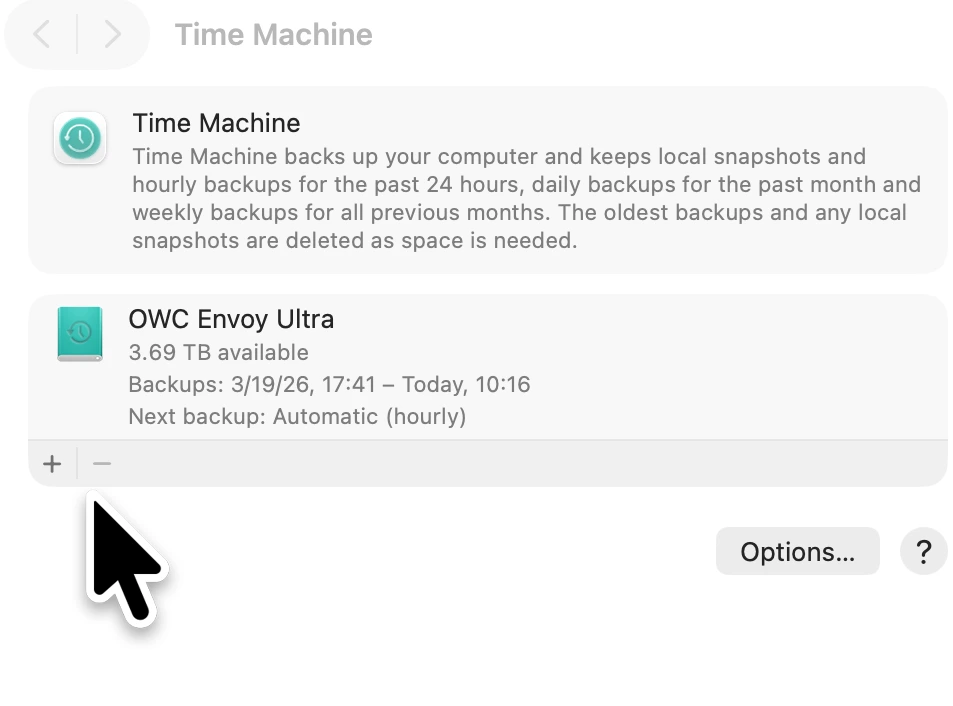 Time Machine settings showing a configured backup drive and the plus button to add a disk